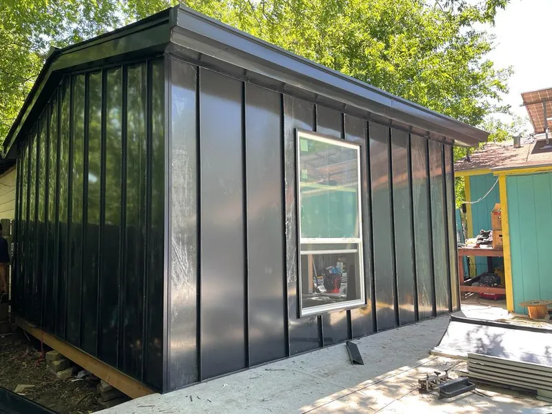 Black standing seam metal wall panels for Roof Inspection in Lake Wales